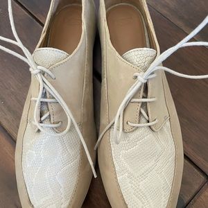 These are adorable loafers, in a buff color with a cool snakeskin effect detail.